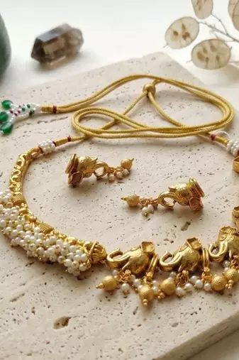antique gold elephant temple choker necklace set with pearls