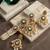 gold plated kundan pearl bridal jewelry set with earrings & maang tikka