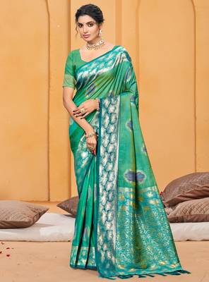 emerald green color beautiful soft silk blend woven designer partywear ethnic saree 1