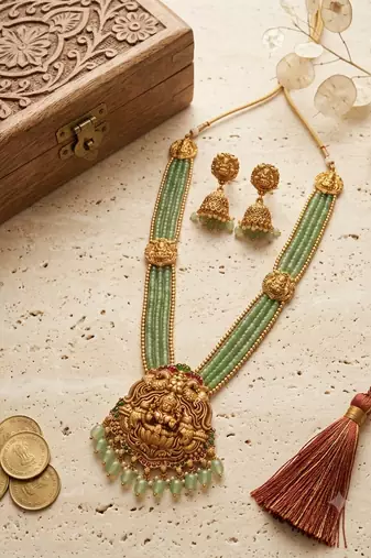 gold plated temple haram set with green bead necklace & jhumkas