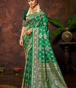 smart and ethnic emerald green color silk blend fabric woven designer ethnic rich looks saree