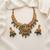 antique gold lakshmi temple necklace set with emerald green stones