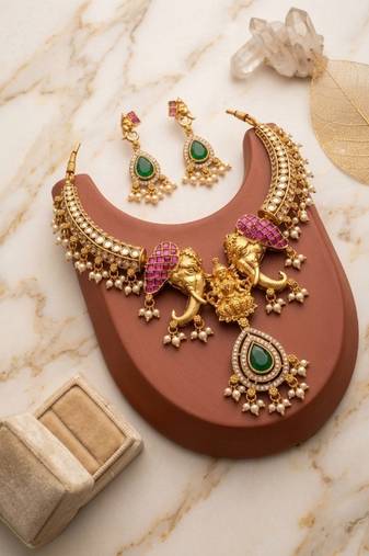 antique gold elephant kundan necklace set with mint green beads