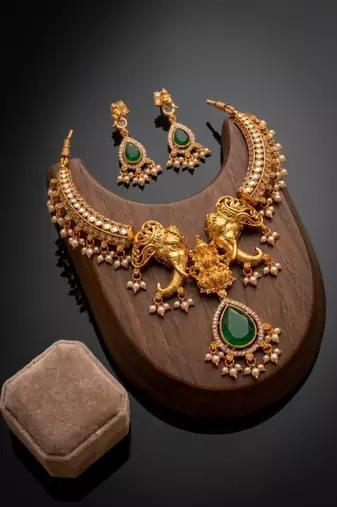antique gold elephant kundan necklace set with mint green beads