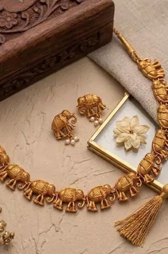 gold temple elephant necklace set with stud earrings