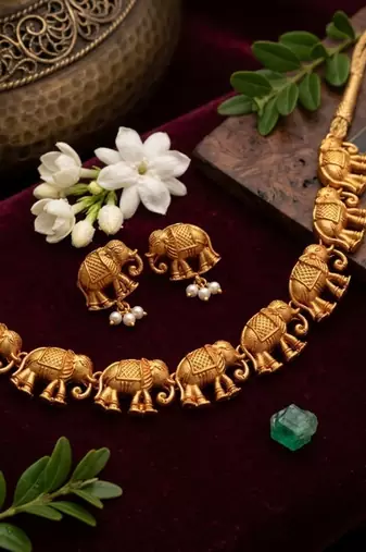 gold temple elephant necklace set with stud earrings