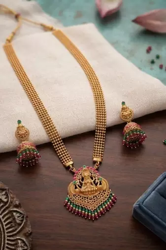 gold temple lakshmi necklace set with green & red beads and jhumkas