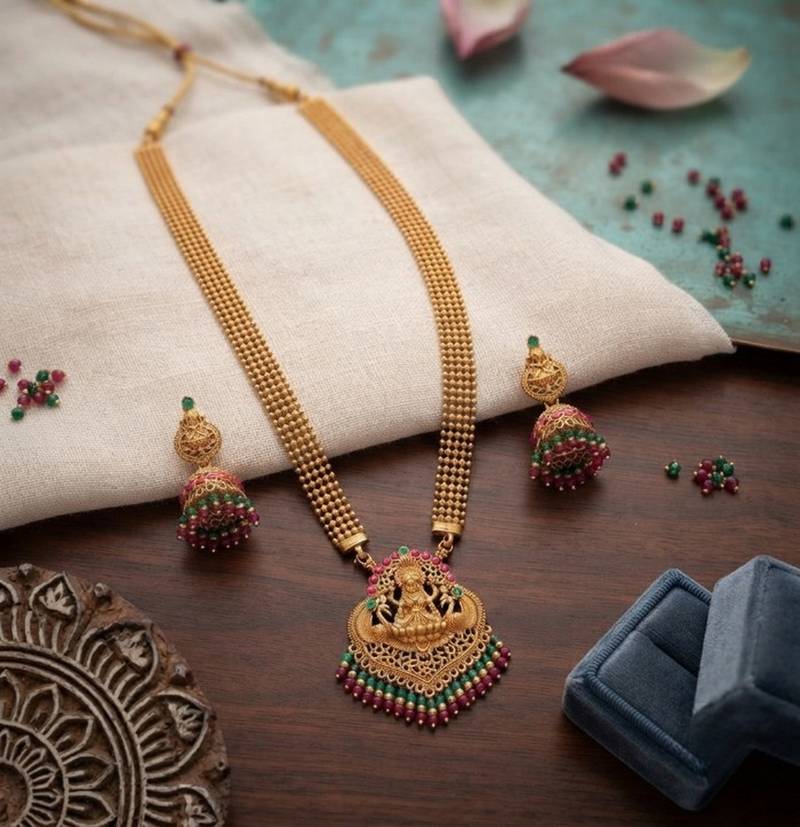 gold temple lakshmi necklace set with green & red beads and jhumkas