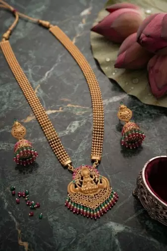 gold temple lakshmi necklace set with green & red beads and jhumkas