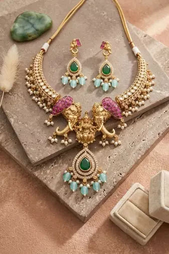 antique gold elephant kundan necklace set with mint green beads