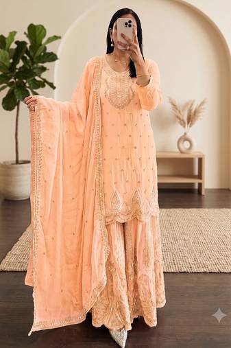 Pastel pink heavy zari work short kurti with flared sharara & dupatta