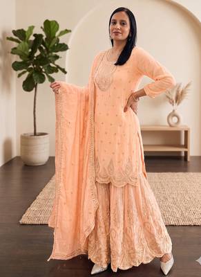Pastel pink heavy zari work short kurti with flared sharara & dupatta 2