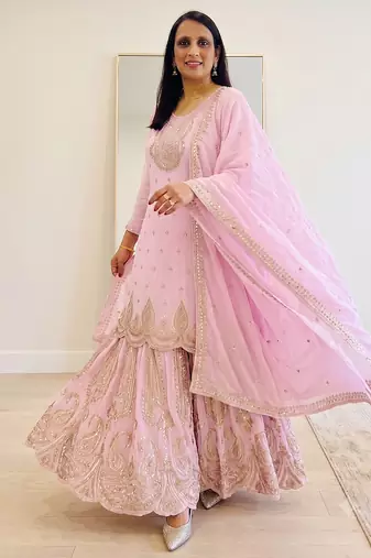 Pink heavy zari work short kurti with flared sharara & dupatta