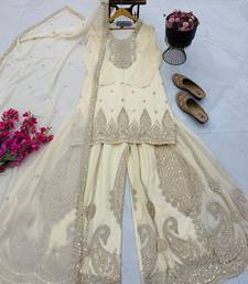 White heavy zari work short kurti with flared sharara & dupatta