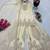 White heavy zari work short kurti with flared sharara & dupatta