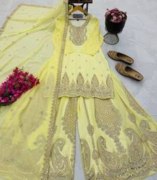 Yellow heavy zari work short kurti with flared sharara & dupatta