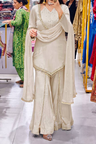Off-white embroidered short kurti with flared pants & mirror-work dupatta set