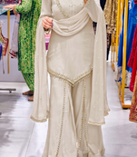 Off-white embroidered short kurti with flared pants & mirror-work dupatta set