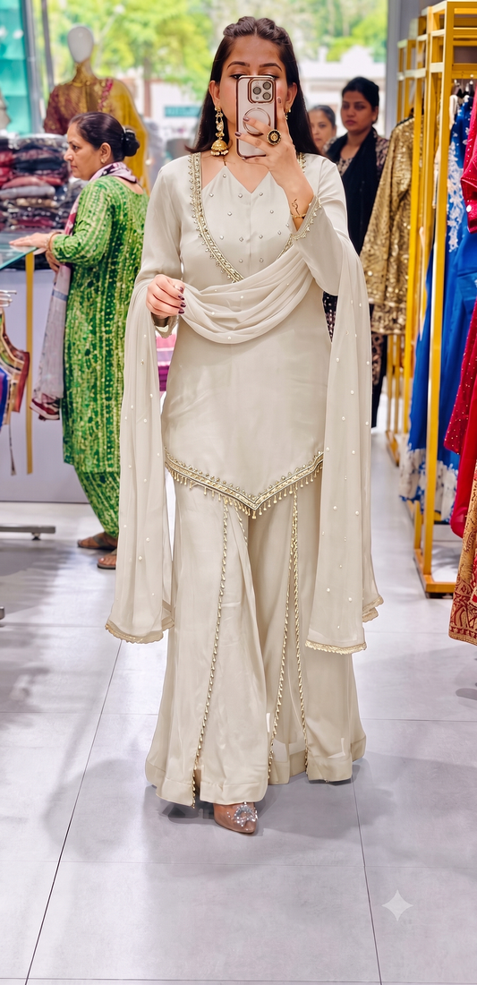 Off-white embroidered short kurti with flared pants & mirror-work dupatta set
