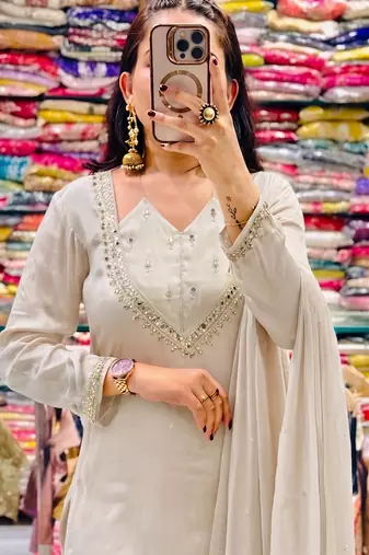 Off-white embroidered short kurti with flared pants & mirror-work dupatta set