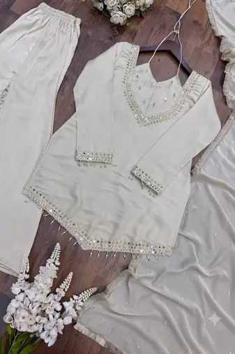 Off-white embroidered short kurti with flared pants & mirror-work dupatta set