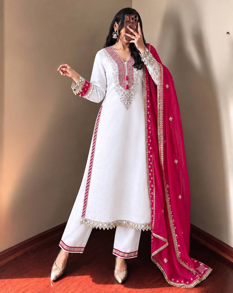 White heavy embroidered kurti pant set with contrast rani pink silk dupatta