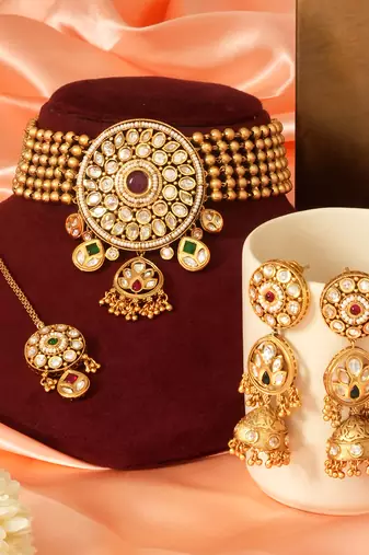 Gold plated royal kundan bridal necklace set with maang tikka