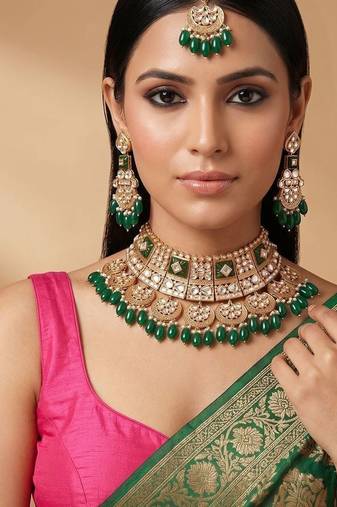 Emerald green kundan bridal choker set with maang tikka