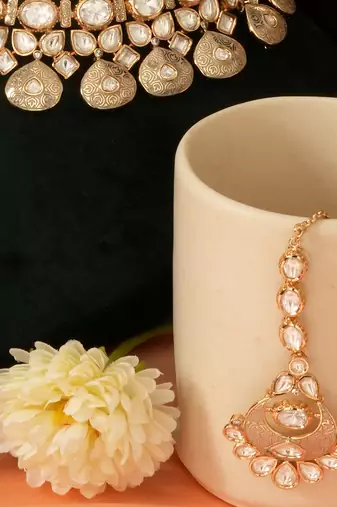 Gold plated kundan meena bridal choker set with maang tikka