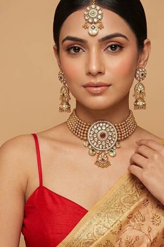 Royal gold plated kundan bridal choker set with maang tikka