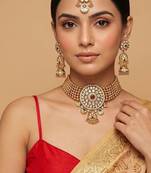 Royal gold plated kundan bridal choker set with maang tikka
