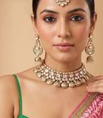 Gold plated regal kundan bridal choker set with maang tikka