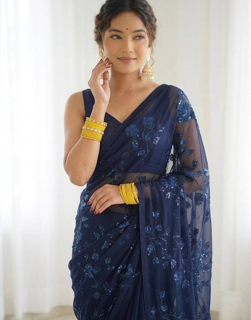 Blue floral sequins embroidered georgette party wear saree with blouse piece