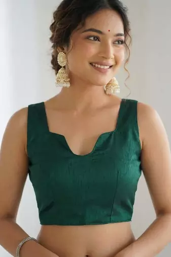 Green floral sequins embroidered georgette party wear saree with blouse piece
