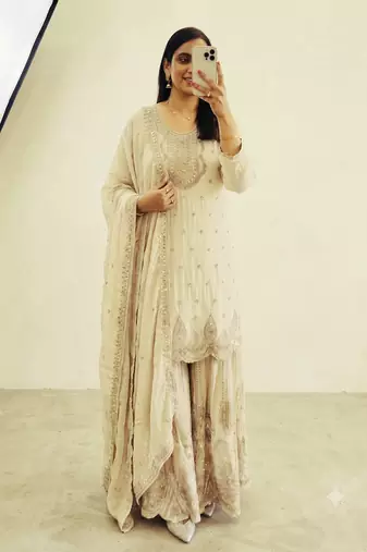 White heavy zari work short kurti with flared sharara & dupatta