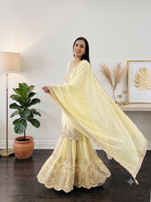 Yellow heavy zari work short kurti with flared sharara & dupatta 3