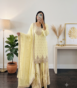Yellow heavy zari work short kurti with flared sharara & dupatta