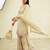 White heavy zari work short kurti with flared sharara & dupatta