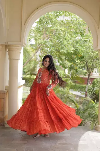 Orange georgette readymade navratri anarkali suit with laheriya & patchwork