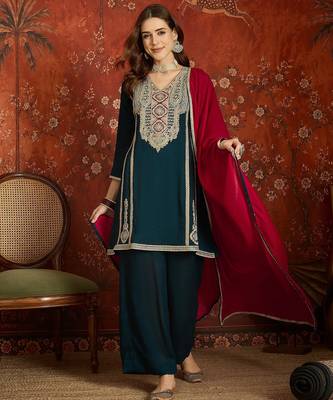 Women teal vichitra silk embroidered kurta set 1
