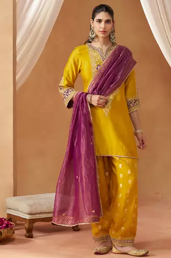 Mustard yellow kurta with salwar and dupatta