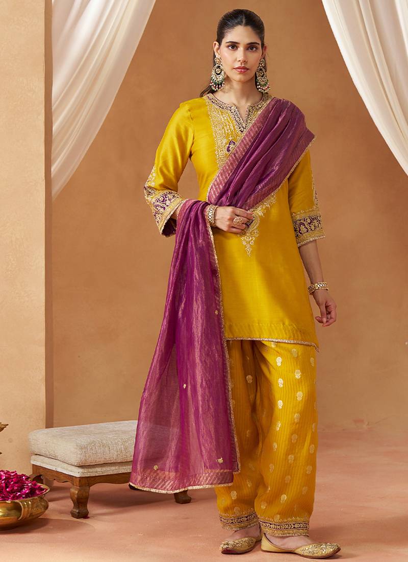 Mustard yellow kurta with salwar and dupatta