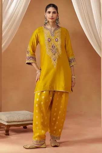 Mustard yellow kurta with salwar and dupatta