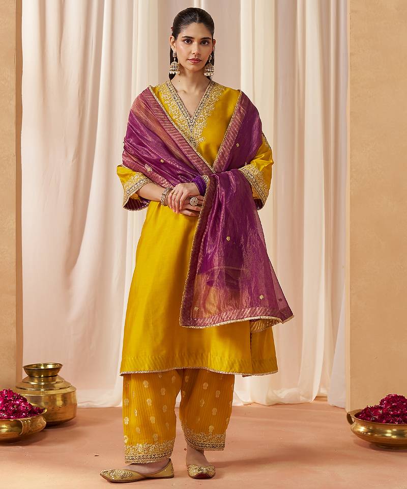 Mustard yellow chauga with salwar with dupatta