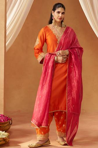 Burnt orange chauga with salwar and dupatta