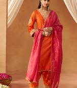 Burnt orange chauga with salwar and dupatta