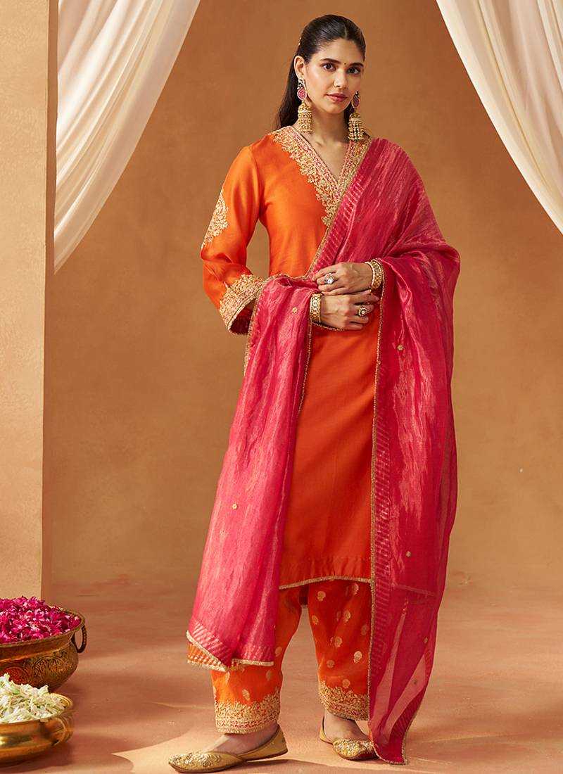 Burnt orange chauga with salwar and dupatta