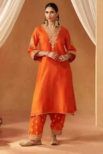 Burnt orange chauga with salwar and dupatta