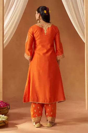 Burnt orange chauga with salwar and dupatta
