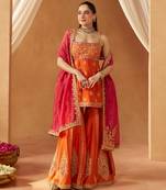 Burnt orange kurta with gharara and dupatta
